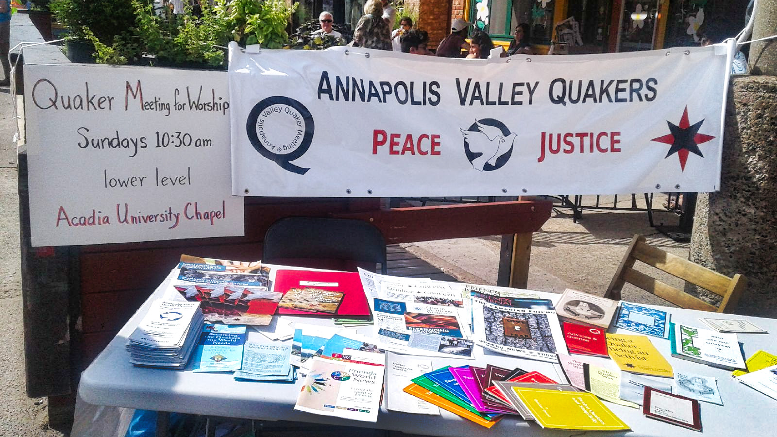 Photo of the Annapolis Valley Quakers table at the Welcome to Wolfville Street Party